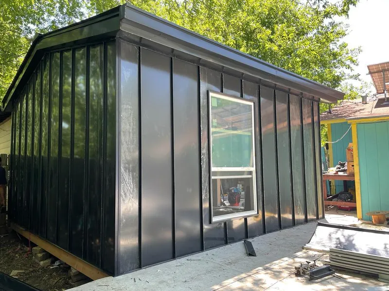 Black standing seam metal wall panels for Roof Inspection in Catskill